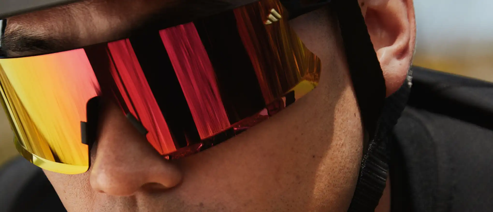 Cyclist wearing adidas Sport sunglasses